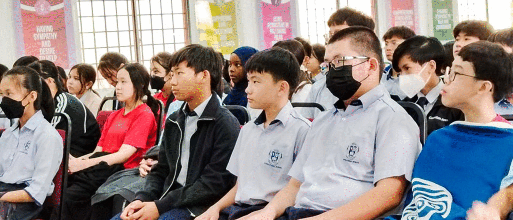 Students at Regent International School Malaysia attending a safety awareness session during assembly