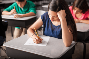 Student preparing for Checkpoint Exams Malaysia under Cambridge International Curriculum”